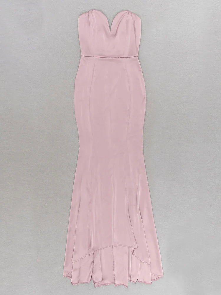 Pink strapless gown on a gray background