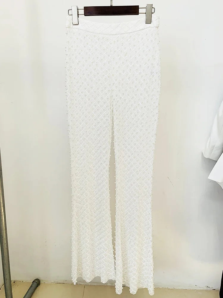 White lace skirt on a hanger against a white background