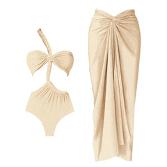Close-up view of a beige one-piece swimsuit with a one-shoulder strap and a draped maxi skirt, shown as a set.