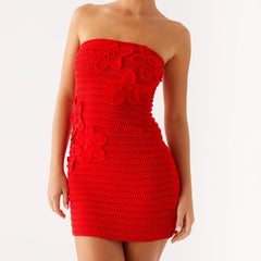 Red strapless dress on a white background