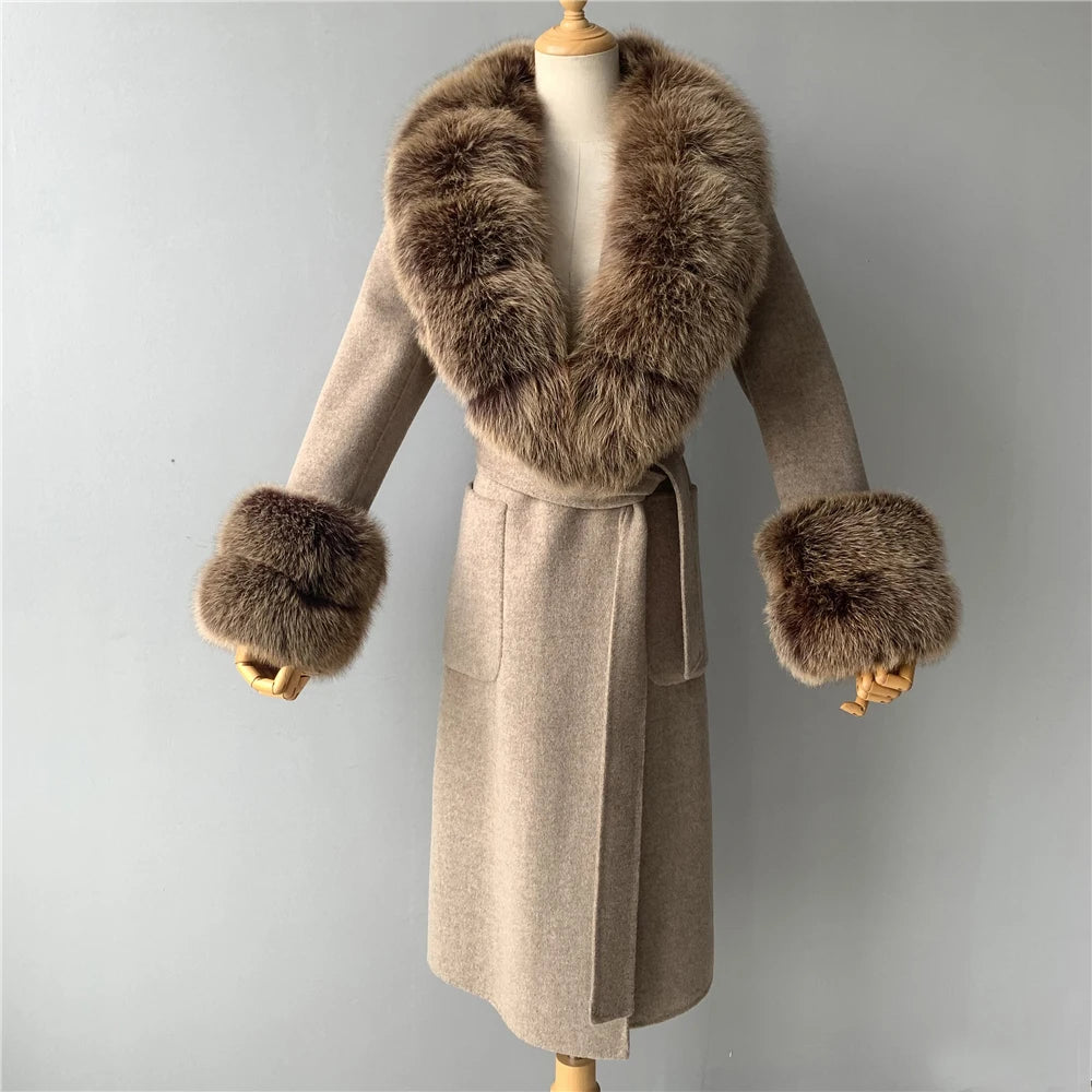 Beige coat with fur collar and cuffs on a mannequin against a gray background