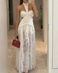 White lace halter neck maxi gown with tiered ruffles and cutout details
