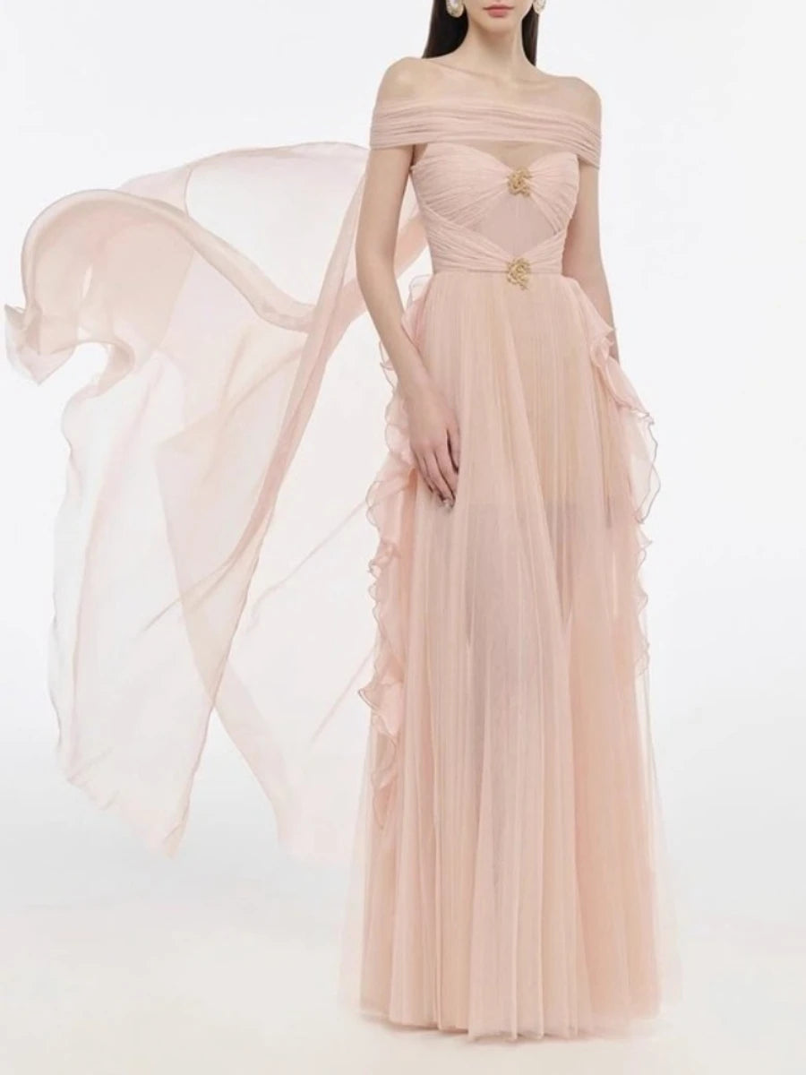 Pink off-shoulder gown with a sheer overlay