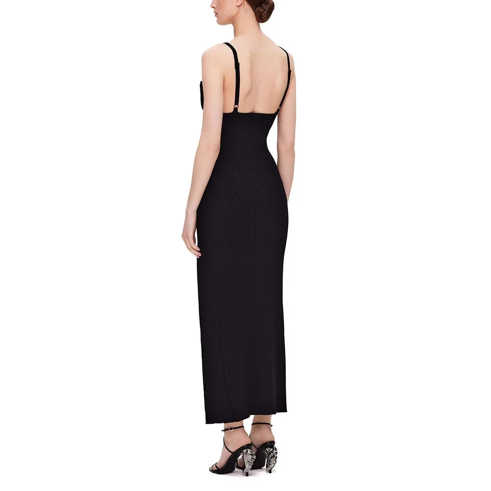 Black evening gown with thin straps on a white background