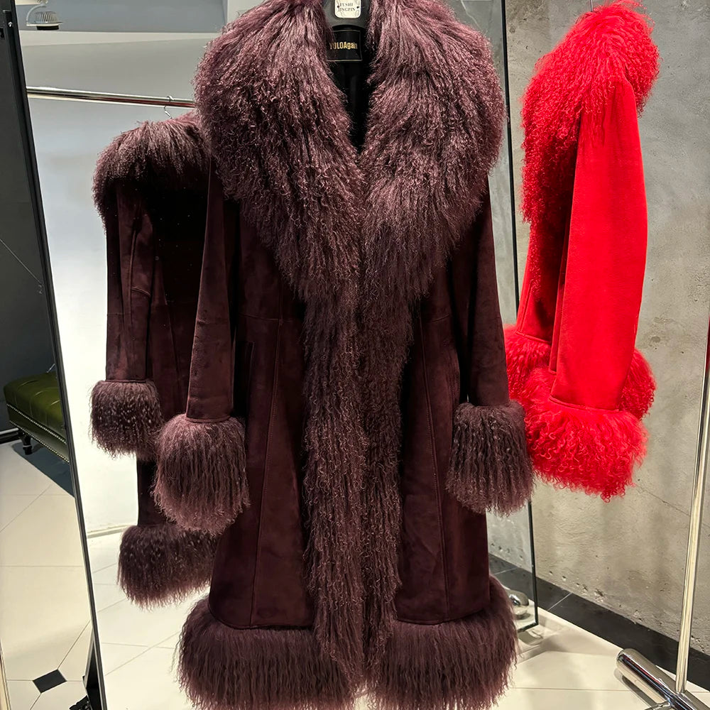 Brown fur coat with matching gloves and red fur coat in a store setting