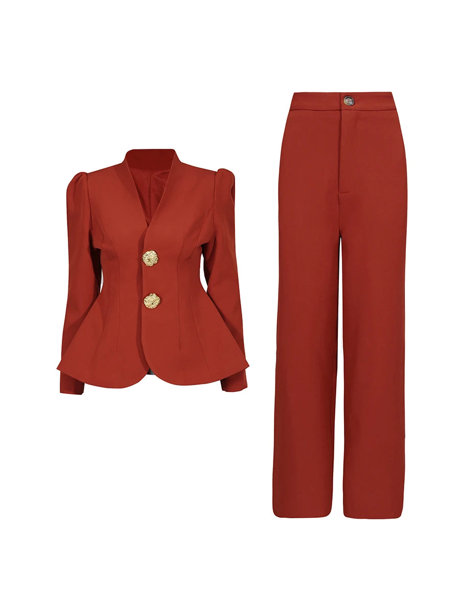 Red suit jacket with gold buttons and matching pants on a white background