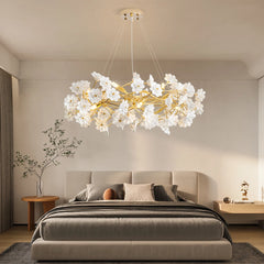 Modern chandelier with floral design in a bedroom setting