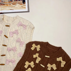 Close-up of the vest, showcasing the intricate 3D bow and soft knit texture. Golden Atelier 2