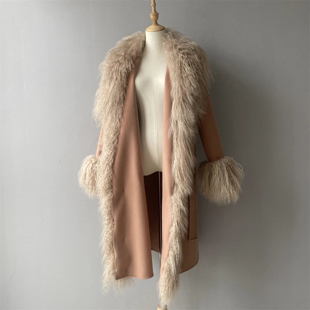 Beige coat with fur trim on a mannequin against a gray background