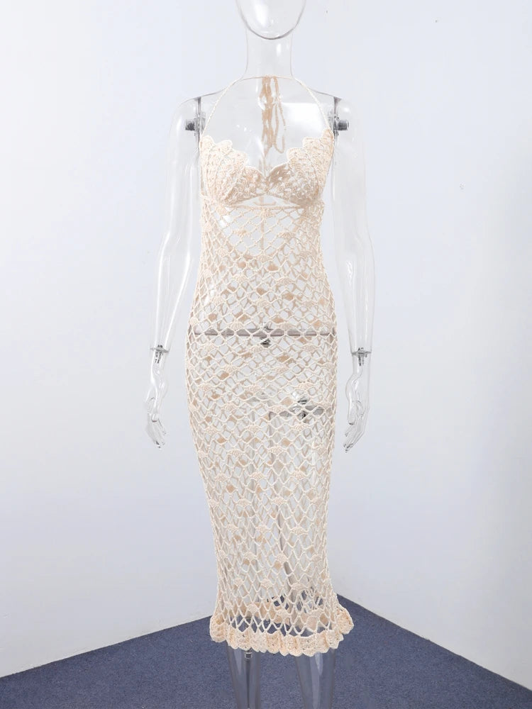 White lace dress on a mannequin against a white background