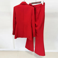 Red suit jacket and flared trousers hanging on a rack