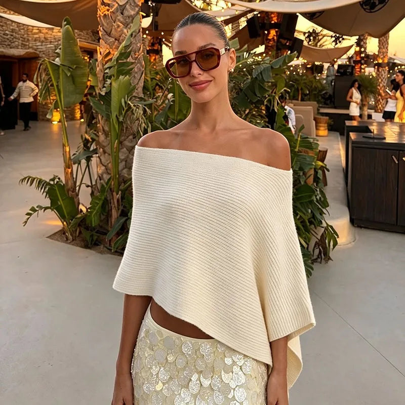 Off-shoulder knit top with asymmetrical hem