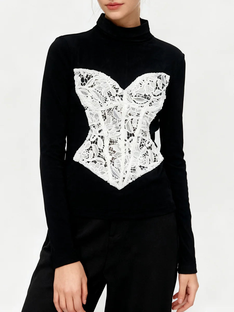 Black turtleneck sweater with white lace corset design on a white background