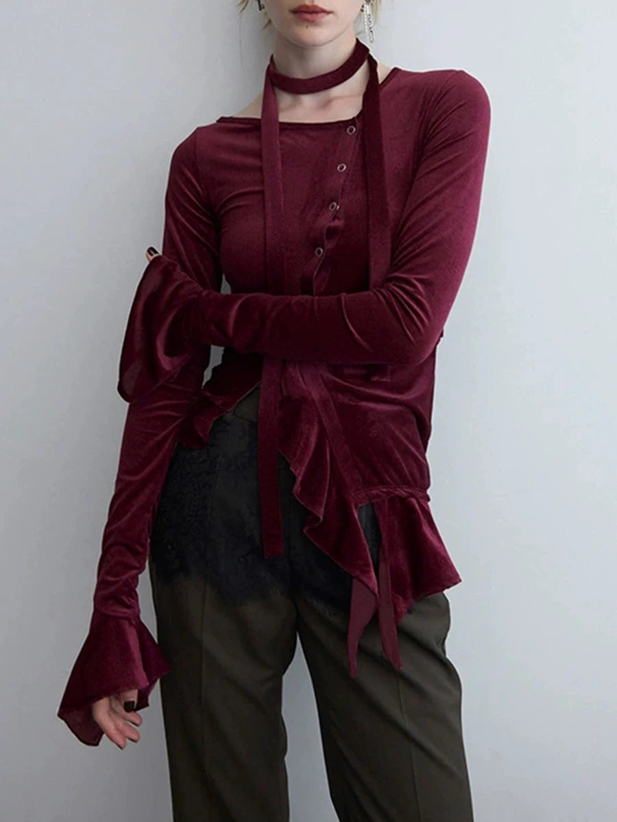 Velvet asymmetrical buttoned ruffle hem top in burgundy