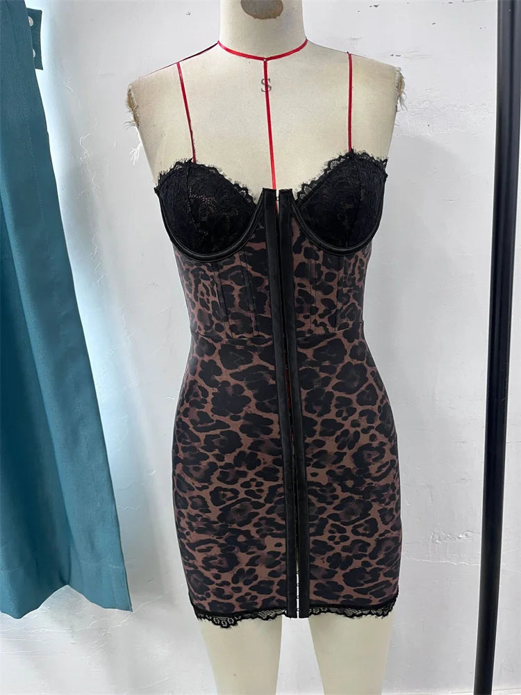 Black lace dress with leopard print pattern on a mannequin