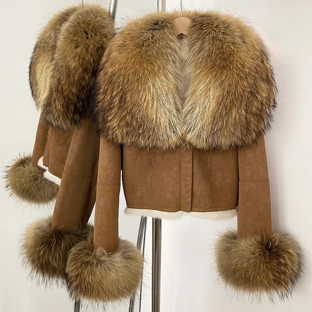 Brown suede jacket with fur trim on a mannequin against a white background