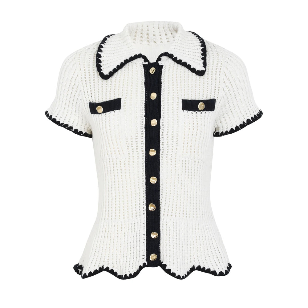 White knit collared short sleeve top with black trim and gold buttons