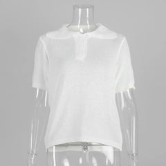 White top on a mannequin against a gray background