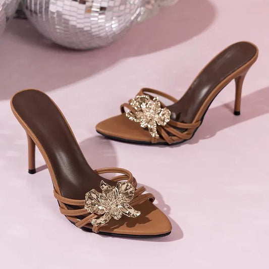 Brown stiletto heels with gold floral embellishment