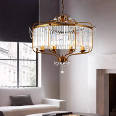 A modern crystal and iron chandelier with LED lights, illuminating a stylish living room.