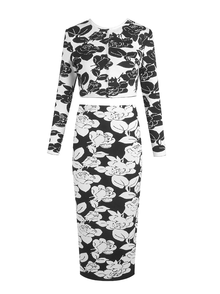 Black and white floral patterned dress on a white background