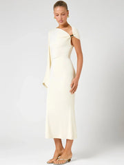 Studio shot of a cream one shoulder midi dress