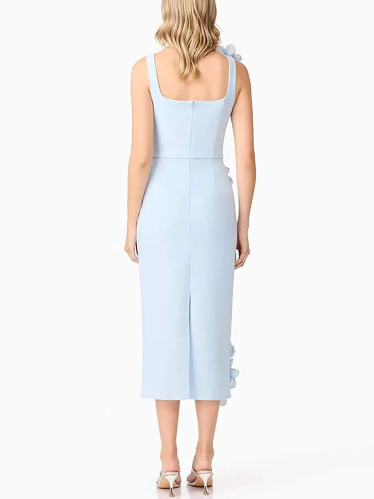 Light blue dress with a subtle pattern on a white background