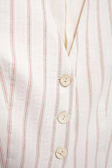 Close-up of the vest showcasing its unique striped pattern and button-up detail. Golden Atelier 4