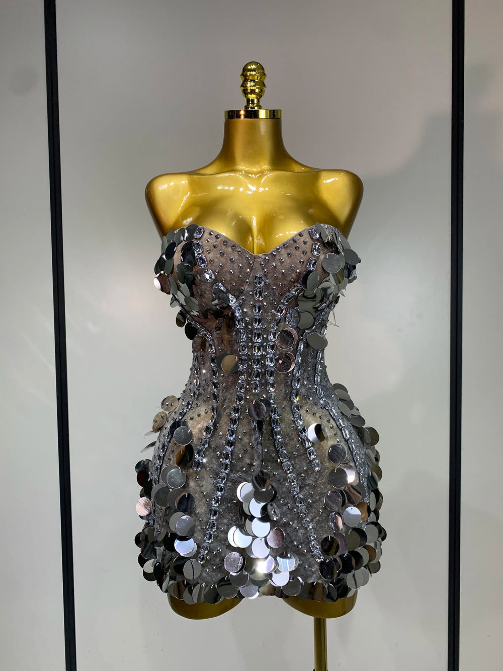Sequined strapless mini dress front view