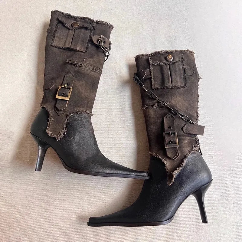 Assembled pointed toe boots with chain detail