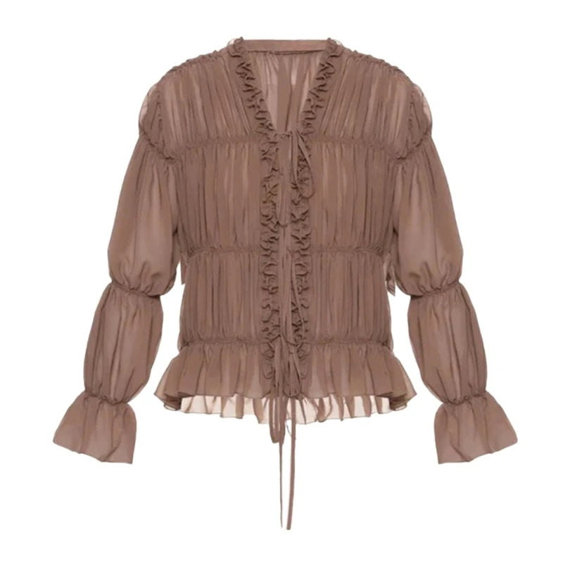 Brown blouse with ruffled details on a white background