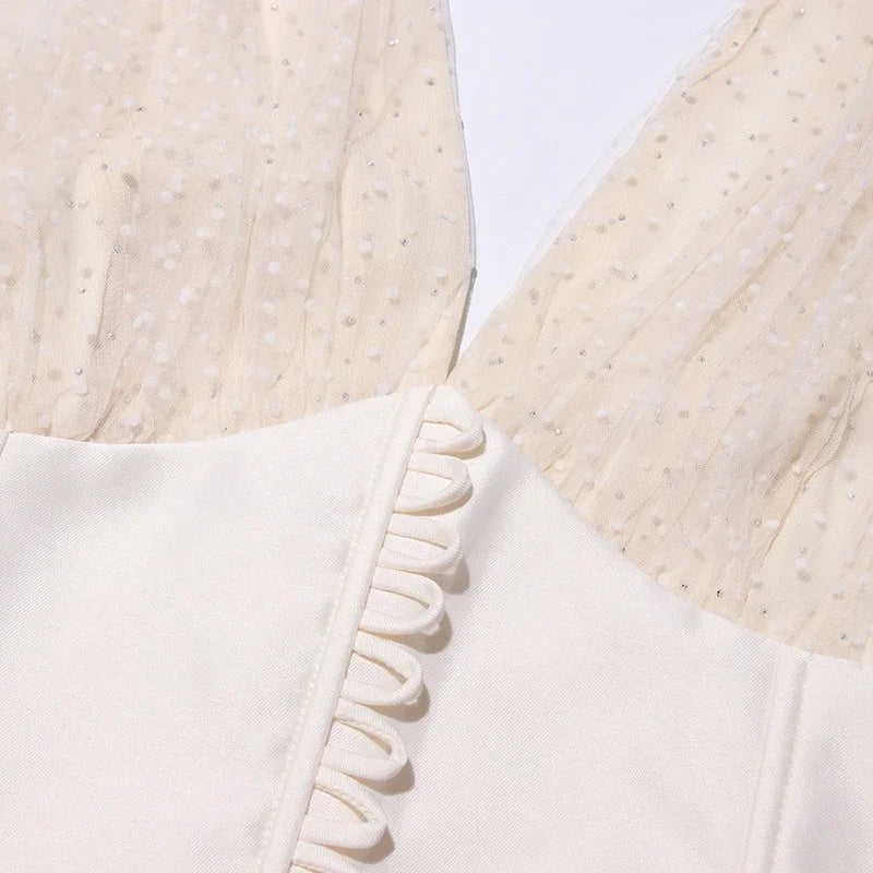 Close-up of a textured fabric with ruffled edge on a light background