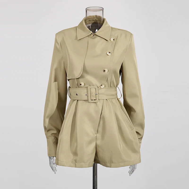 Beige trench coat on a mannequin against a white background