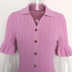 Purple blouse with ruffled sleeves on a mannequin against a white background