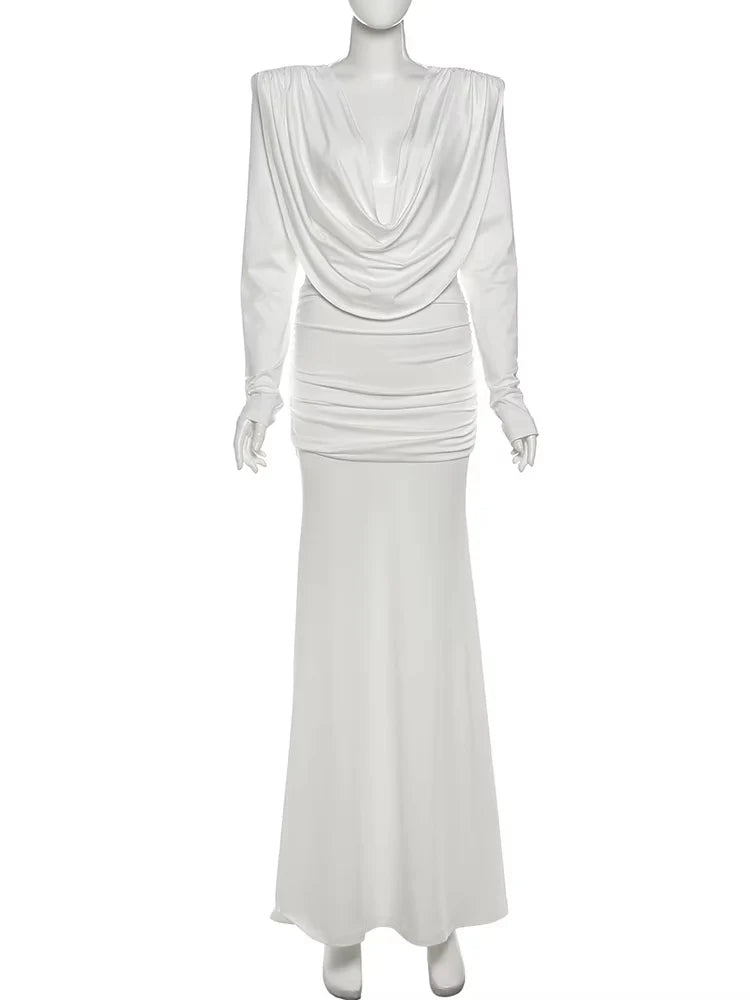 White evening gown on a mannequin against a white background