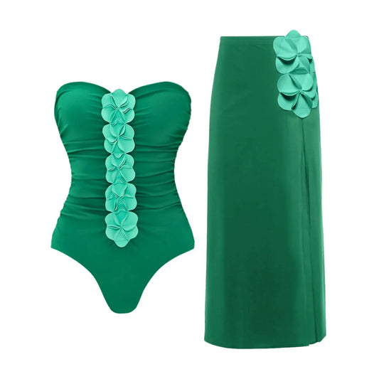 Strapless swimsuit with green floral appliqués and matching high-waist maxi skirt