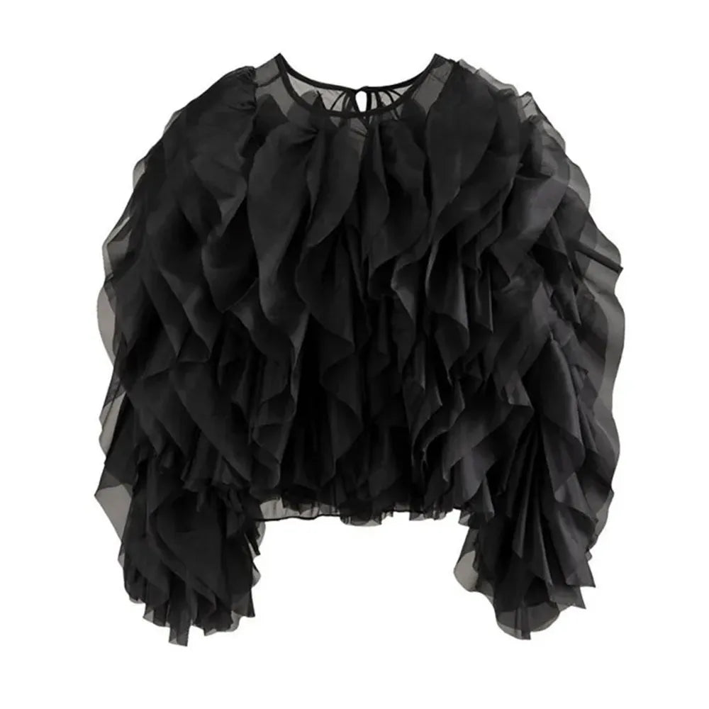 Black ruffled blouse on a white background
