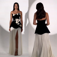 close view of sculpted strapless bodice with textured floral details
