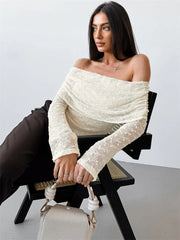 Women’s knit sweater backless pullover with patchwork and off-shoulder design.