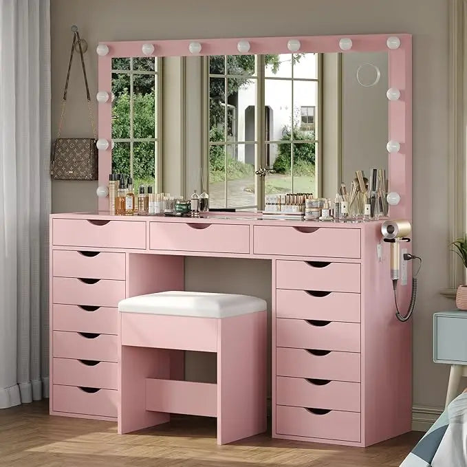 Pink vanity with mirror and drawers in a room setting