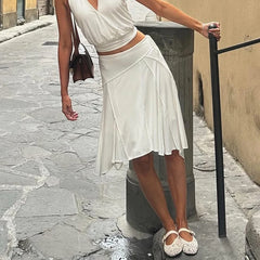 Irregular split midi skirt with paneled design