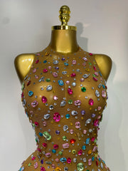 Model wearing rhinestone mesh bodysuit