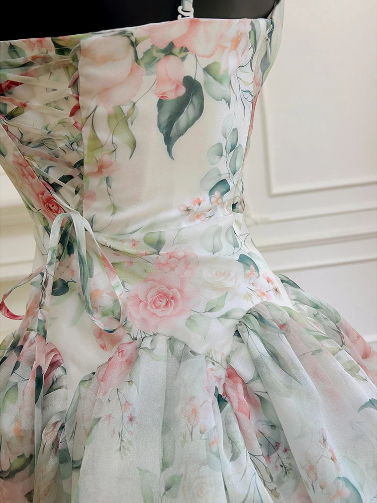 Close-up of the lace-up back and ruffled skirt on the midi dress