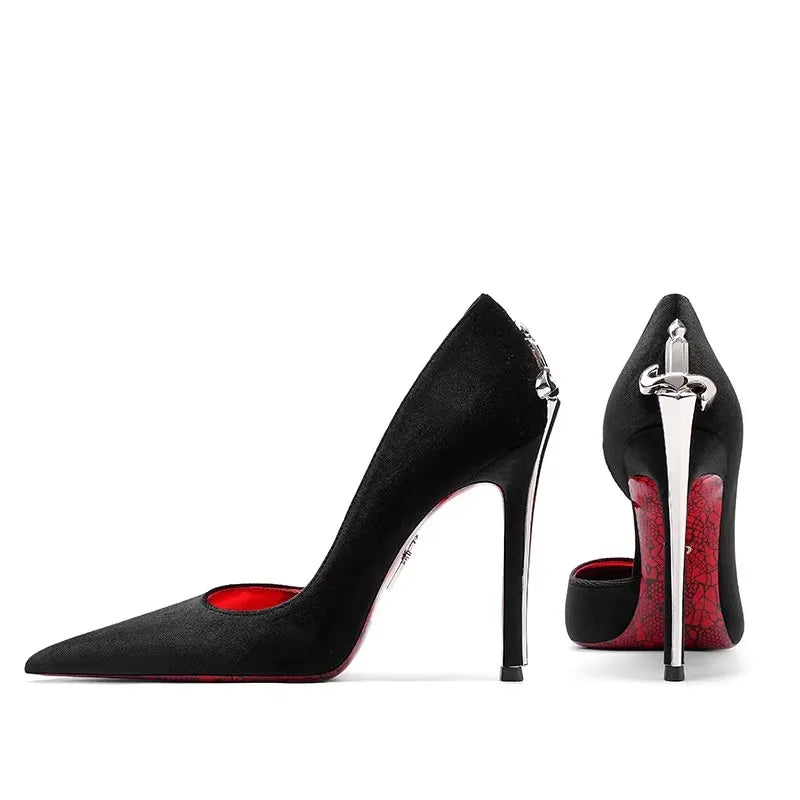 Black high-heeled shoes with red interior and silver heel clips on a white background