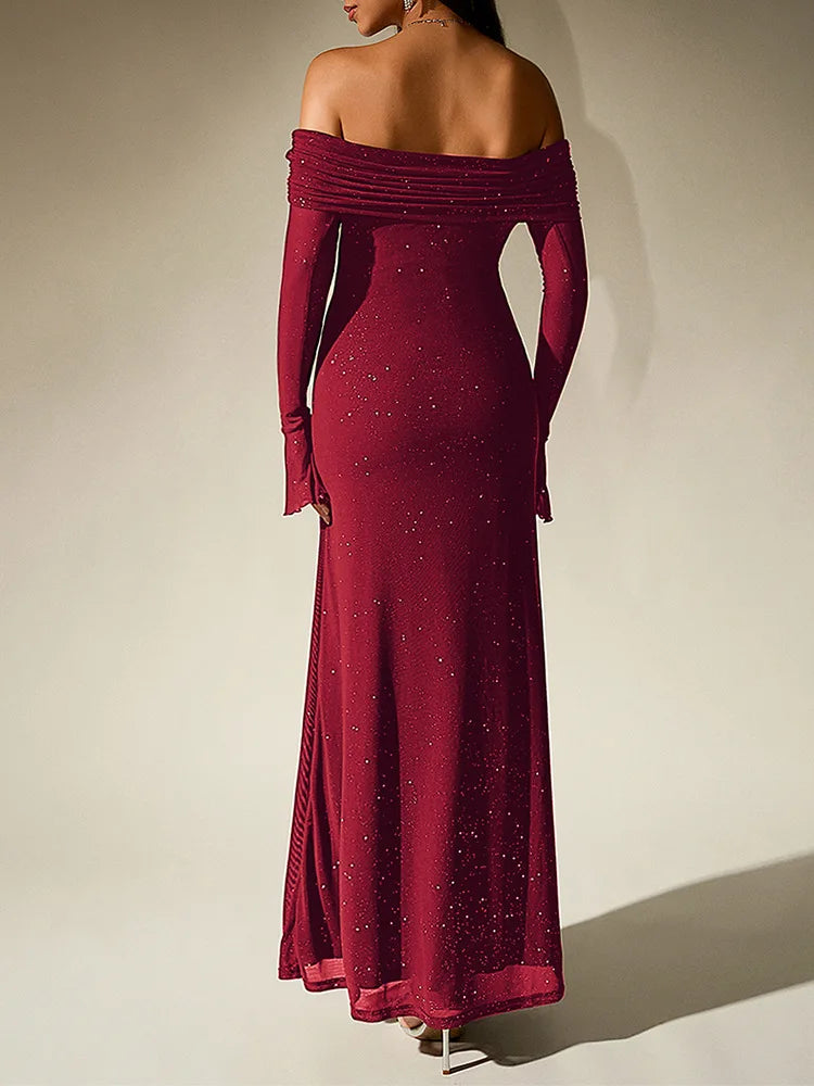 Red off-shoulder evening gown with long sleeves on a plain background