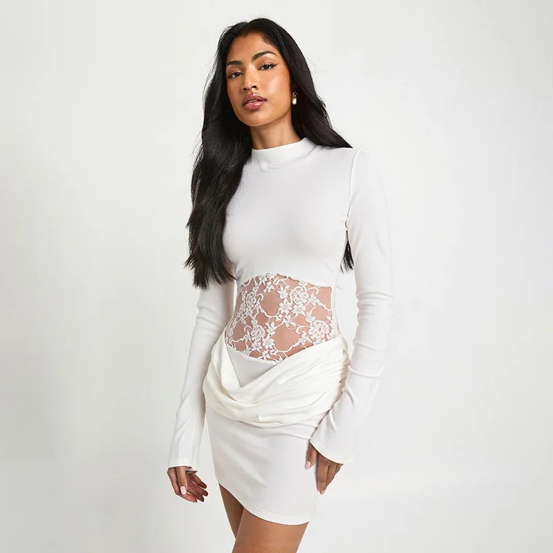 Slim-fit dress with lace waist panel styled for an elegant night out