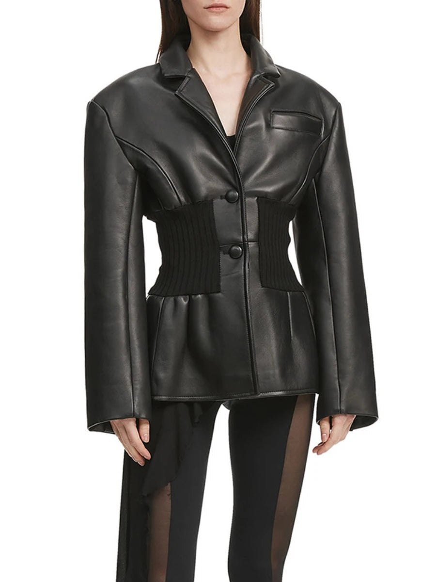 Black leather jacket worn by a model 