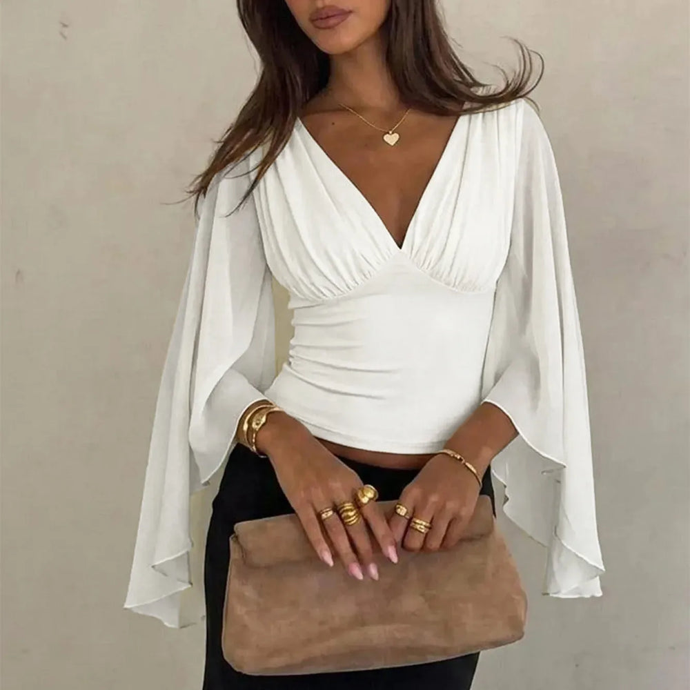 Ruched V-neck cape sleeve top in white with accessories