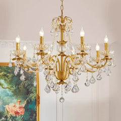 Retro brass chandelier with crystal accents and candle-style lights, illuminating a luxurious dining room. Golden Atelier 2