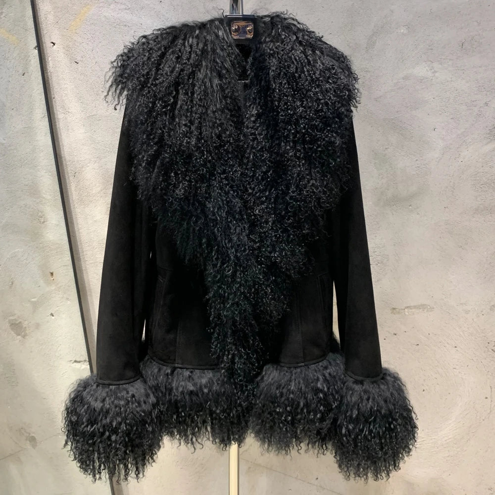 Black jacket with fur trim on a neutral background